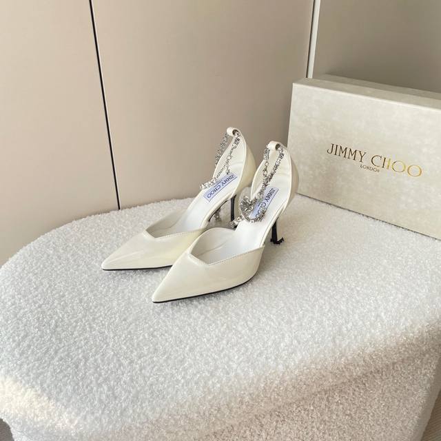 橙子出厂价Jimmy Choo 周仰杰 Jc新款 水钻链条尖头中空高跟鞋单鞋凉鞋做最强大的搭配，仙境般的存在.性感又强势的姿态让客户都非常满意2024、An E